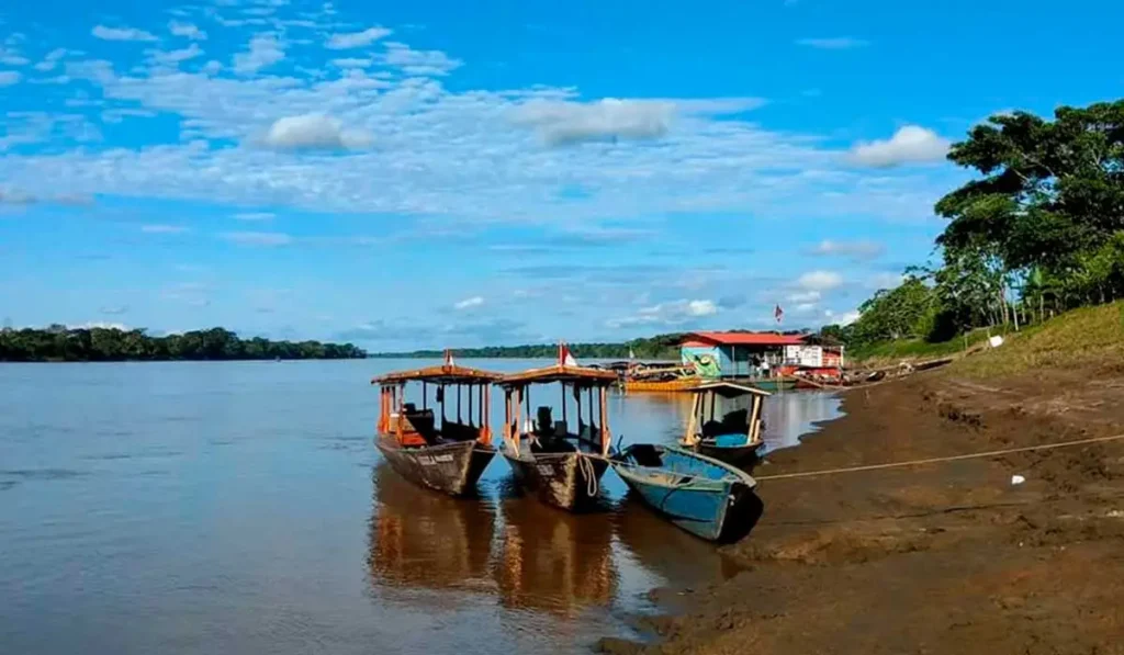 Boats docked on the riverbank in Puerto Maldonado, Peruvian Amazon